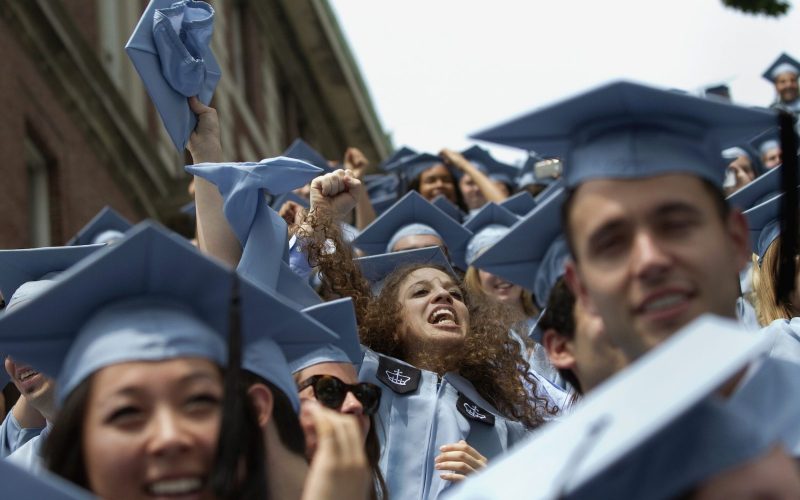 Graduates from Columbia University's School of Journalism cheer during the university's commencement ceremony in New York May 16, 2012. Over 12,000 students attended the annual graduation ceremony on the university's campus. REUTERS/Keith Bedford  (UNITED STATES - Tags: EDUCATION) - RTR325VM